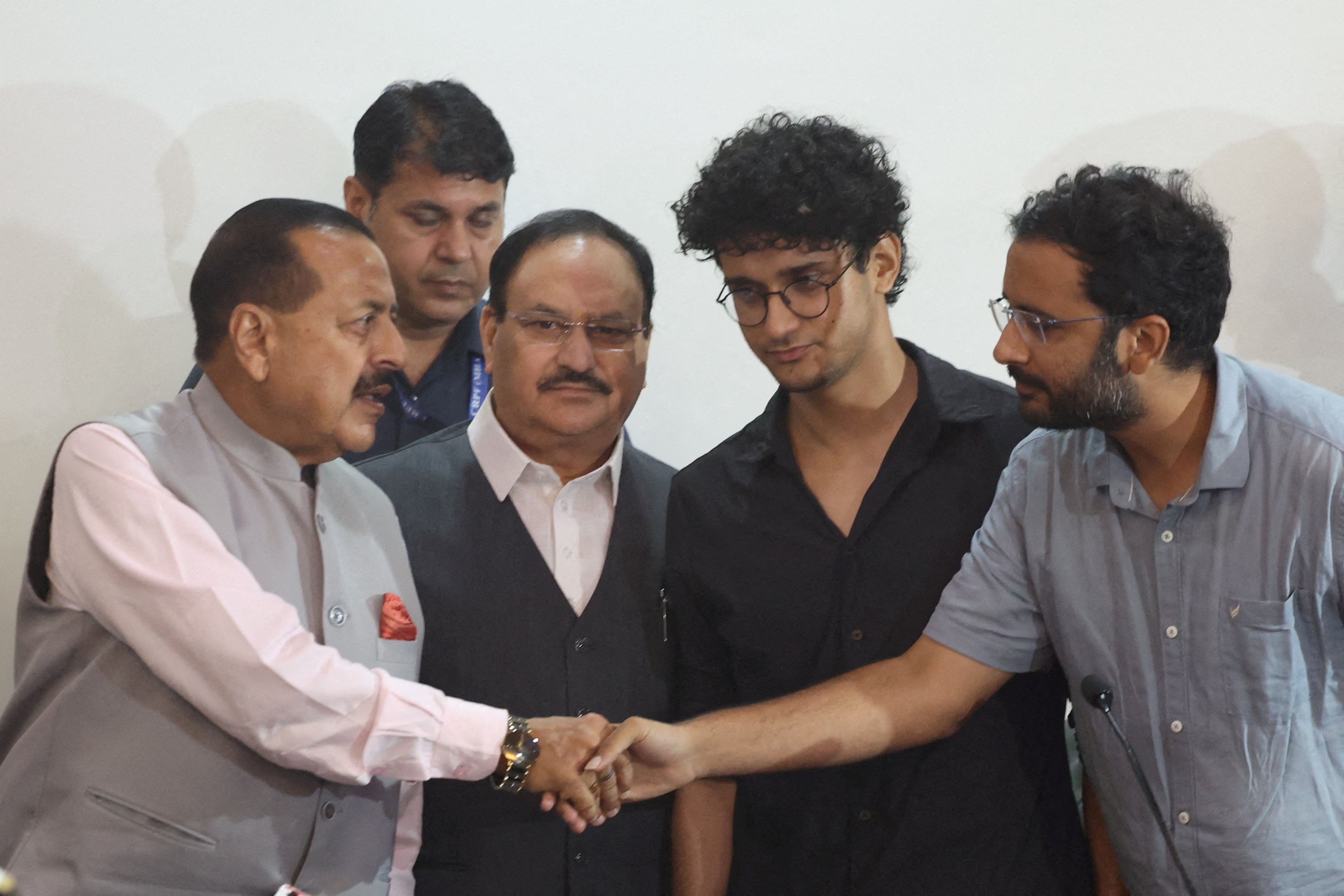 Union ministers JP Nadda and Jitendra Singh, and CJP's Saurav Das and Ashutosh Ranka, after holding a press conference after Education Minister Dharmendra Pradhan resigned. (REUTERS)