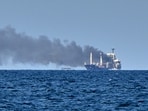 Smoke rises from the grain carrier Golden Leo under the Guinea-Bissau flag after Russian missile strike in the Black Sea close to Odessa, Ukraine, Sunday, July 19, 2026, local media reports.