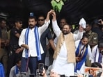 Azad Samaj Party national president Chandra Shekhar Azad with Apni Janta Party chief Swami Prasad Maurya during a protest at Eco Garden in Lucknow on Saturday. (Mushtaq Ali/HT)