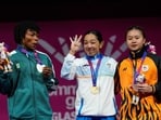 Commonwealth Games 2026 LIVE UPDATES Day 4: Gold medalist India's Mirabai Chanu (centre) celebrates on the podium for the women's 48 kilogram weightlifting