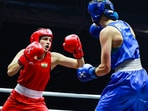 File picture of Indian boxer Parveen Hooda (red), who will compete in 65kg at the Glasgow Commonwealth Games. (BFI Photo)