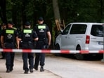 Police secure the area at Tiergarten park after a deadly incident in which a vehicle crashed into a crowd near Berlin's annual Christopher Street Day Pride parade on Saturday evening, leaving multiple people injured and the parade called off, in Berlin, Germany, July 26, 2026.