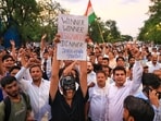 Congress leaders and workers take out a 'Vijay March' after Union Education Minister Dharmendra Pradhan resigns, taking responsibility for the NEET paper leak, at Statue Circle, in Jaipur, Rajasthan, Saturday, July 25, 2026.