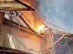Traders said that as smoke engulfed the market, the PSPCL complaint centre was informed but they got no immediate assistance. (HT PHOTO)