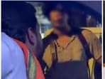 In the video, the man is heard verbally abusing the students before proceeding to grab the collar of one of them and hitting him.