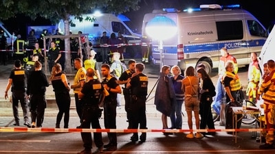 Emergency personnel and police gather in Berlin, early Sunday, July 26, 2026, following the cancellation of Christopher Street Day festivities. (AP)