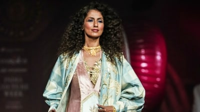 The official description of Masaba's bridal collection explains, “The journey begins in the sacred landscapes of India before drifting into the blue-green waters of Antigua and the vibrant tropics of the Caribbean. Bridal seamlessly transforms into resort bridal.” (PTI) The official description of Masaba's bridal collection explains, “The journey begins in the sacred landscapes of India before drifting into the blue-green waters of Antigua and the vibrant tropics of the Caribbean. Bridal seamlessly transforms into resort bridal.” (PTI)
