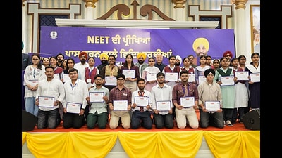 Punjab chief minister Bhagwant Mann with the 882 government school students, who qualified NEET UG 2026, in Mohali on Sunday. (@BhagwantMann X)