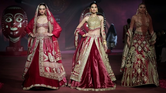 For Masaba, models took to the runway in an array of traditional ensembles, dressed in stunning full-flared lehengas.(Shazid Chauhan)