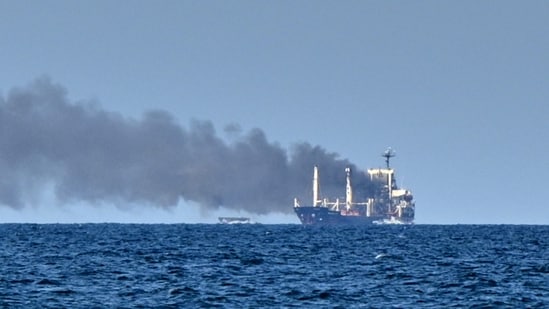 Smoke rises from the grain carrier Golden Leo under the Guinea-Bissau flag after Russian missile strike in the Black Sea close to Odessa, Ukraine, Sunday, July 19, 2026, local media reports.