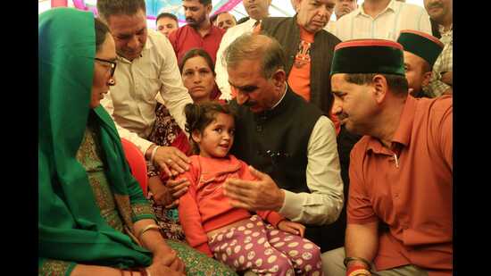 Himachal chief minister Sukhvinder Singh Sukhu meet the families in Boh Valley on Sunday. (HT Photo)