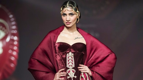 A model walks the ramp showcasing a creation by designer Masaba Gupta during the India Couture Week, in New Delhi.&nbsp;(PTI)