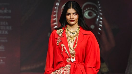 Intricately embroidered dupattas, metallic zari work, shimmering sequins, and meticulous handcrafted embellishments were also seen on the runway.&nbsp;(PTI)