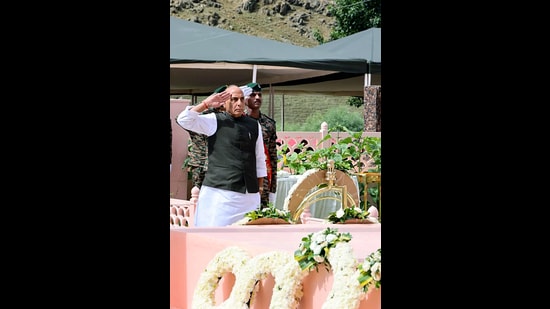 Union defence minister Rajnath Singh pays tributes to the martyrs at Kargil War Memorial in Dras on Sunday. (@rajnathsingh X)