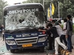 Protesters seen by a police van during a protest march to Parliament on July 20. 