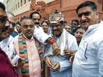 Former Union Education Minister and BJP MP Dharmendra Pradhan arrives at Parliament as BJP-NDA MPs welcome him during the Monsoon Session, in New Delhi.