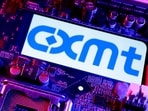 CXMT logo and computer motherboard are seen in this illustration taken April 14, 2026. 
