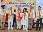 Former president Ram Nath Kovind conferring degrees on students at DAV College in Hoshiarpur on Sunday. (HT photo) Former president Ram Nath Kovind conferring degrees on students at DAV College in Hoshiarpur on Sunday. (HT photo)