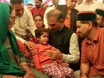 Himachal chief minister Sukhvinder Singh Sukhu meet the families in Boh Valley on Sunday. (HT Photo)