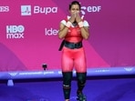 India's Gyaneshwari Yadav celebrates her silver medal in women’s 53kg weightlifting at the Glasgow Commonwealth Games on Monday. (AP Photo)