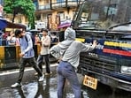 Mumbai: Rhiya Ahir, a 27-year-old model, stands with her arms outstretched in front of a police van during a demonstration in solidarity with the CJP's agitation over the alleged NEET irregularities, in Mumbai, Wednesday, July 22, 2026. (PTI)