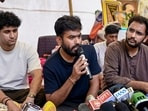 Cockroach Janta Party (CJP) founder Abhijeet Dipke addresses a press conference as party spokepersons Saurav Das and Ashutosh Ranka look on, amid the protest over NEET paper leak issue, at Jantar Mantar