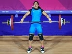 India's Bindyarani Devi competes in the Women's 58kg weightlifting event. 
