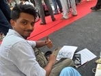 Victim showing his hand where he allegedly received pellet injuries during the clashes. 