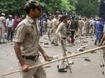 Police personnel carry out a lathi charge on protesters during the protest march against the alleged NEET paper leak from Jantar Mantar to Parliament House in New Delhi.