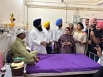 Punjab State Scheduled Castes Commission chairman Jasvir Singh Garhi visiting the injured protesters. (HT)