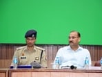 SSP Avinash Pandey and DM VK Singh addressing newspersons in Meerut on Monday (HT Photo)