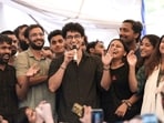 Cockroach Janta Party (CJP) Spokespersons Saurav Das and Ashutosh Ranka, with supporters, celebrate after education minister Dharmendra Pradhan resigned on Saturday.