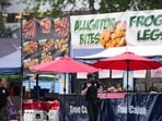 Police respond to a shooting at Seattle Center during the Bite of Seattle food festival Sunday, July 26, 2026, in Seattle, Wash. (AP Photo/Lindsey Wasson)