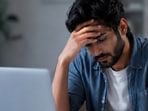Software developer claims he lost job over personality assessment.