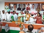 Ward 29 councillor Munawar being welcomed by Congress leaders at an event on Sunday. (HT Photo)
