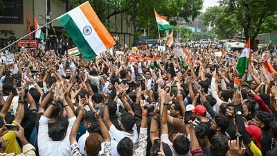 Demonstrators wave the national flag during a CJP protest rally in Mumbai. (AFP) Demonstrators wave the national flag during a CJP protest rally in Mumbai. (AFP)