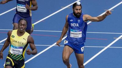 India's Gurindervir Singh finishes second behind Jamaica's Rohan Watson in the men's 100m first round heat at the Glasgow Commonwealth Games on Monday. He was eliminated from the semis. (PTI)