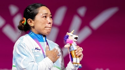 Mirabai Chanu reacts after winning gold medal in the women's 48kg Final weightlifting competition at the 23rd Commonwealth Games. (PTI) Mirabai Chanu reacts after winning gold medal in the women's 48kg Final weightlifting competition at the 23rd Commonwealth Games. (PTI)