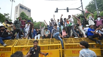 Students celebrate after the  Union Education Minister's resignation, with jubilant scenes unfolding as supporters cheer and mark what they call a victory for the student movement at Jantar Mantar. (Hindustan Times)