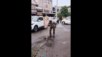 Road cave-in at Mint Ghumri Chowk, in Ludhiana on Monday. (HT Photo)