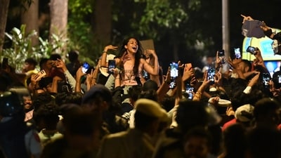 Students celebrate after the education minister's resignation at Jantar Mantar in Delhi on Saturday (Sanchit Khanna/Hindustan Times) Students celebrate after the education minister's resignation at Jantar Mantar in Delhi on Saturday (Sanchit Khanna/Hindustan Times)