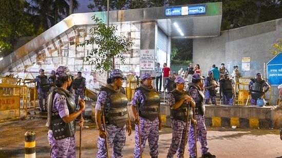 6: Security personnel stand guard at the entrance to Jantar Mantar on Janpath Road