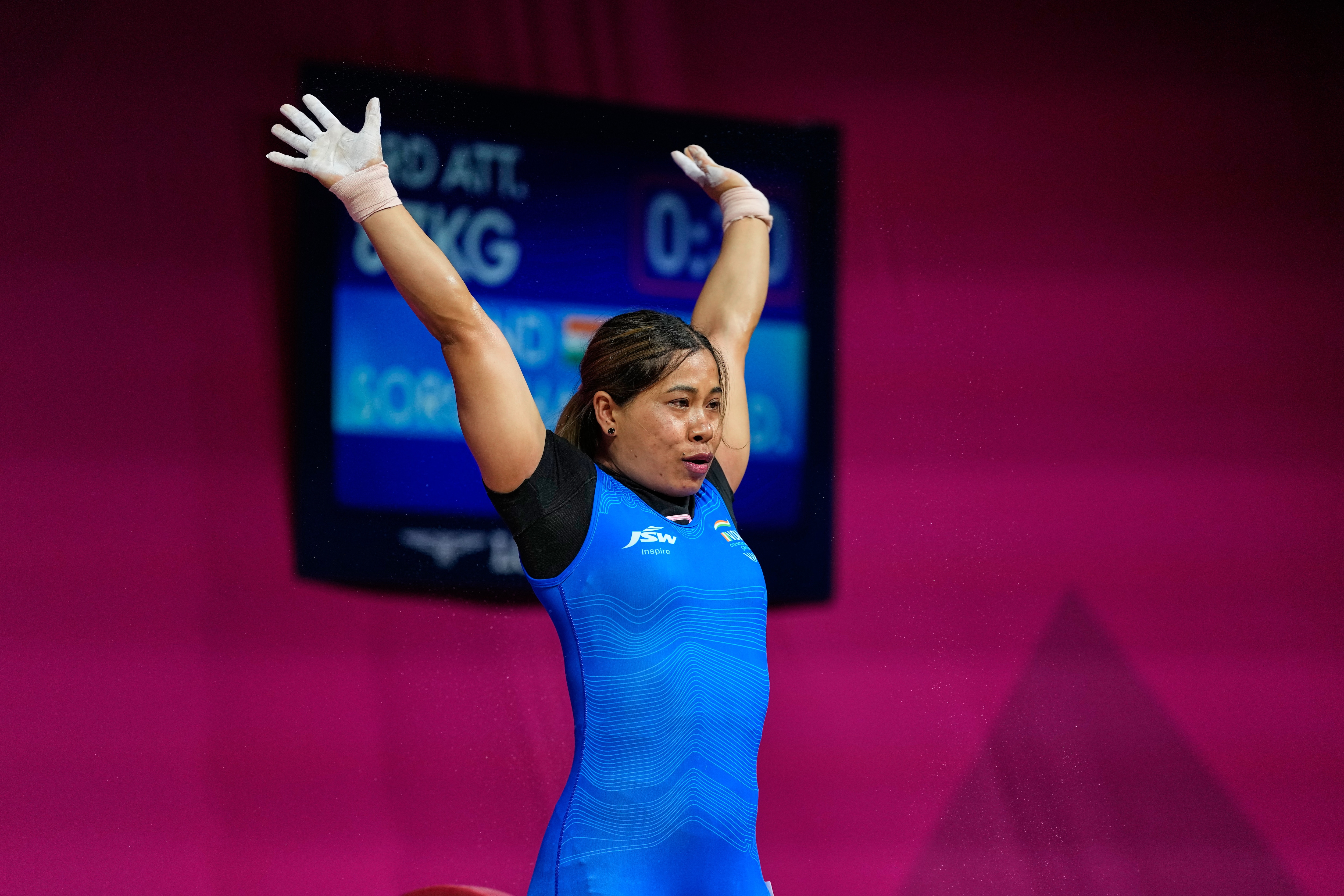 India's Devi Bindyarani Sorokhibam competes in the 58 kilogram category of women weightlifting during the Commonwealth Games in Glasgow (AP Photo/Manish Swarup)