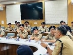 Haridwar SSP Navneet Singh Bhullar briefs Mela Force officials ahead of the Kanwar fair in Haridwar on Tuesday. (HT Photo)