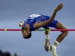 India's Sarvesh Anil Kushare clears the bar during the men's high jump final at the 23rd Commonwealth Games, at Scotstoun Stadium, in Glasgow, Scotland. (PTI)