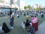 Japan earthquake: People wait in a park after evacuating buildings following a strong earthquake in Kumamoto City, Chuo Ward on July 28, 2026. A major earthquake collapsed buildings and sparked fires in Japan's southwest, Prime Minister Sanae Takaichi said, with broadcaster NHK saying that at least 50 people were taken to hospital. (Photo by JIJI Press / AFP) / Japan OUT