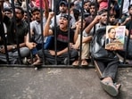 Cockroach Janata Party supporters raise slogans at Jantar Mantar in New Delhi.