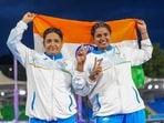 Sharmila Dhankar, left, and Shilpa K Shyla celebrate after winning gold and bronze medals respectively in the women's shot put F57. Sharmila Dhankar, left, and Shilpa K Shyla celebrate after winning gold and bronze medals respectively in the women's shot put F57.