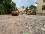 Residents of Sector 46 said potholes, exposed bitumen, construction debris and waterlogging have made several roads unsafe, especially during night-time travel. (Parveen Kumar/HT)