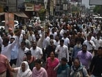 Sanitation workers taking out a protest march in Jalandhar on Monday. (HT)
